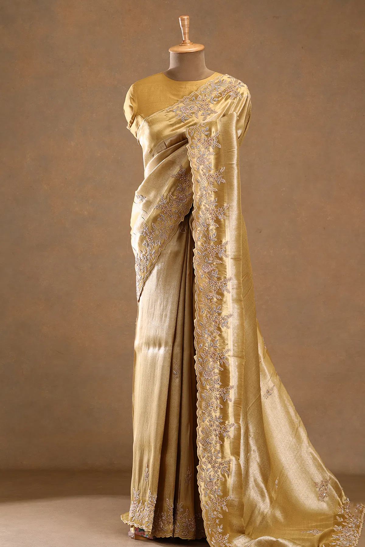 Gold zari woven tissue designer saree
